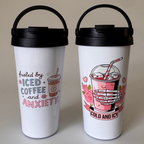 Two white tumblers with black lids featuring coffee-themed designs on a neutral background.