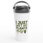 White tumbler with black lid featuring text 'I Just Wet My Plants' and plant illustrations on a white background.