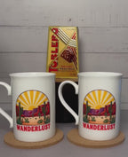 Wanderlust Coffee Mug Gift Set: Porcelain Mugs, Coasters & Chocolate